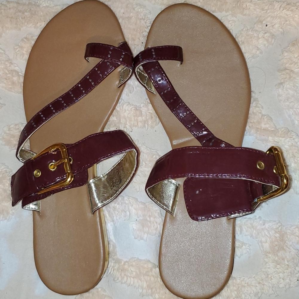 Maroon n gold sandals.
